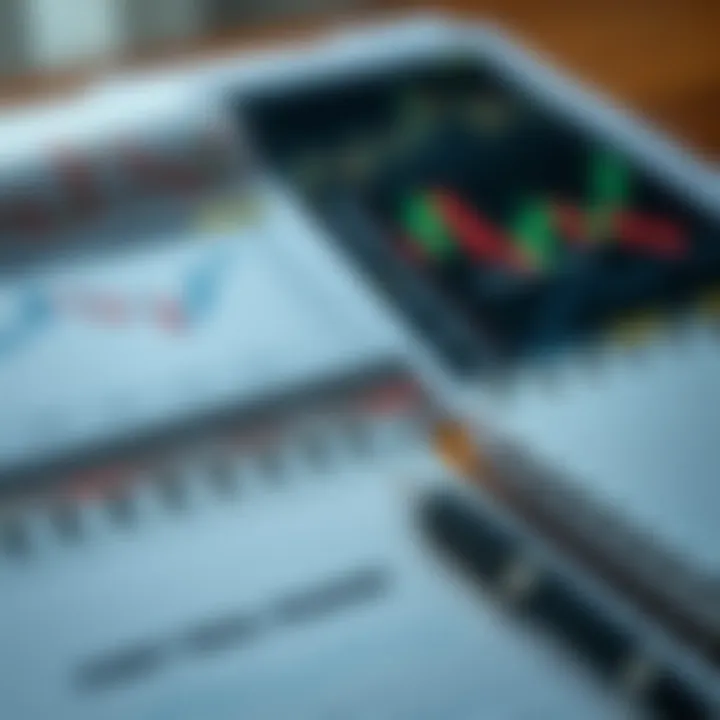 Charts and graphs illustrating forex market trends alongside a pen and notebook